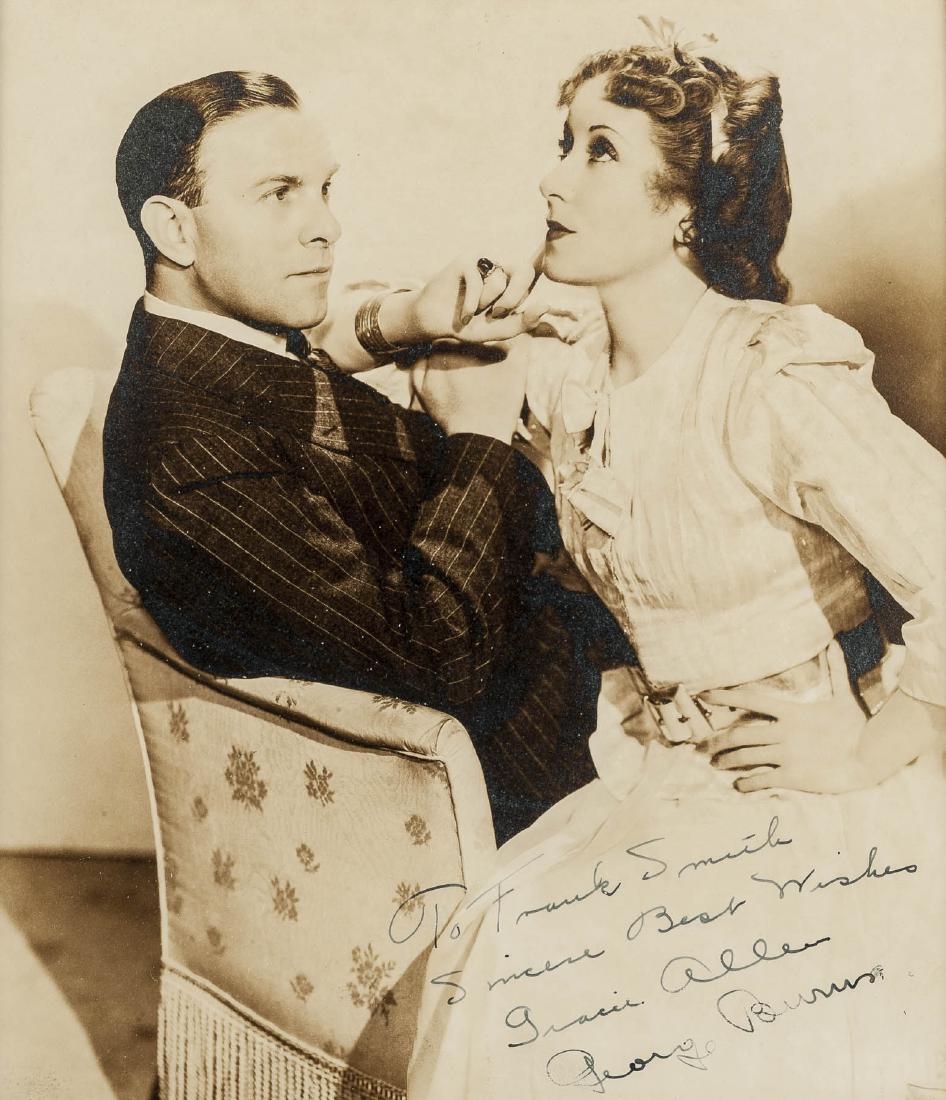 Photograph Signed by George Burns & Gracie Allen: DESCRIPTION: Photograph signed by George Burns and Gracie Allen. Inscribed "To Frank Smith Sincere Best Wishes Gracie Allen George Burns". Wooden frame with mat under glass. MEASUREMENTS: 8-1/2" x 7-1