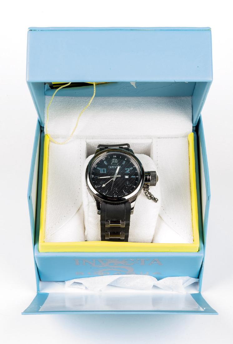 Invicta Sub Aqua Diver Wristwatch: Model 0060, water resistant to 100MT. Black face. 2-1/2" lug to lug. In original box with paperwork.
