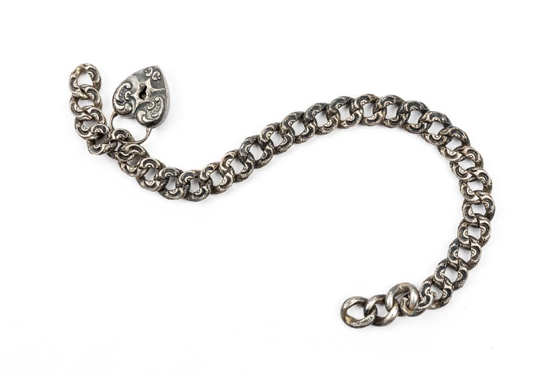 Victorian Locket Bracelet: Sterling etched link bracelet with locket. Missing clasp and key. 8" long.