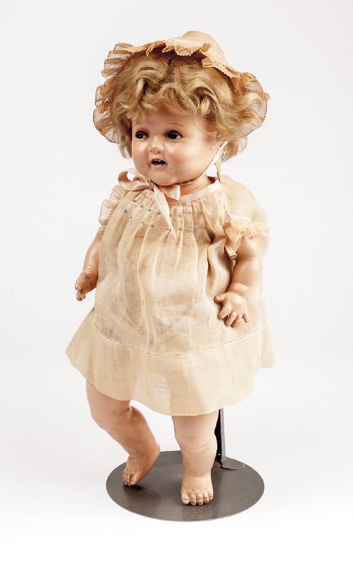 Shirley Temple 17" Baby Doll: DESCRIPTION: Ideal Shirley Temple 17" composition baby doll. Composition limbs and swivel head on shoulder plate. Cloth body with cryer. Flirty sleep eyes with applied lashes. Open mouth with upper an