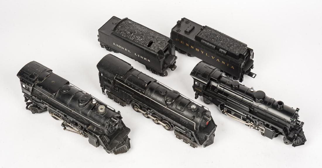 3 Lionel Steam Locomotives: DESCRIPTION: Three Lionel steam locomotives and two tenders. Locomotives include #2020, #2025 and #8632. CONDITION: Wear to cars and trucks as expected with age and use. One locomotive without tender.