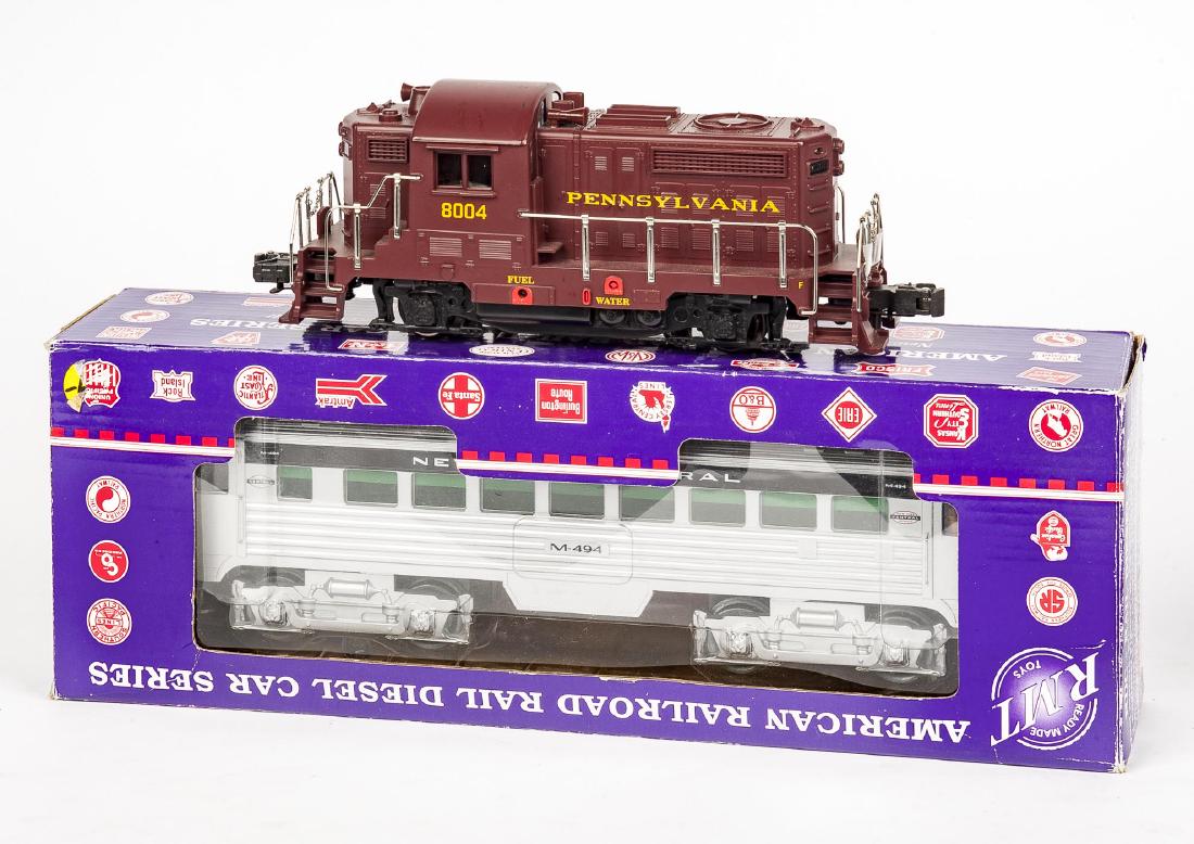 2 RMT Locomotives: DESCRIPTION: Two RMT locomotives. Includes RMT-5212 NY Central #M-494 powered RDC locomotive and RMT-4222 GP PRR diesel locomotive. CONDITION: Lightly if at all used. RMT-5212 in original box. Box wit