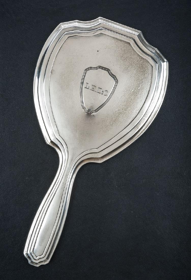 Sterling Hand Mirror: DESCRIPTION: Sterling hand mirror. Hallmarked "EP" and marked "Sterling". Monogrammed. MEASUREMENTS: 5-5/8" x 11". CONDITION: Wear as expected with age and use. Mirror with cloudy appearance.