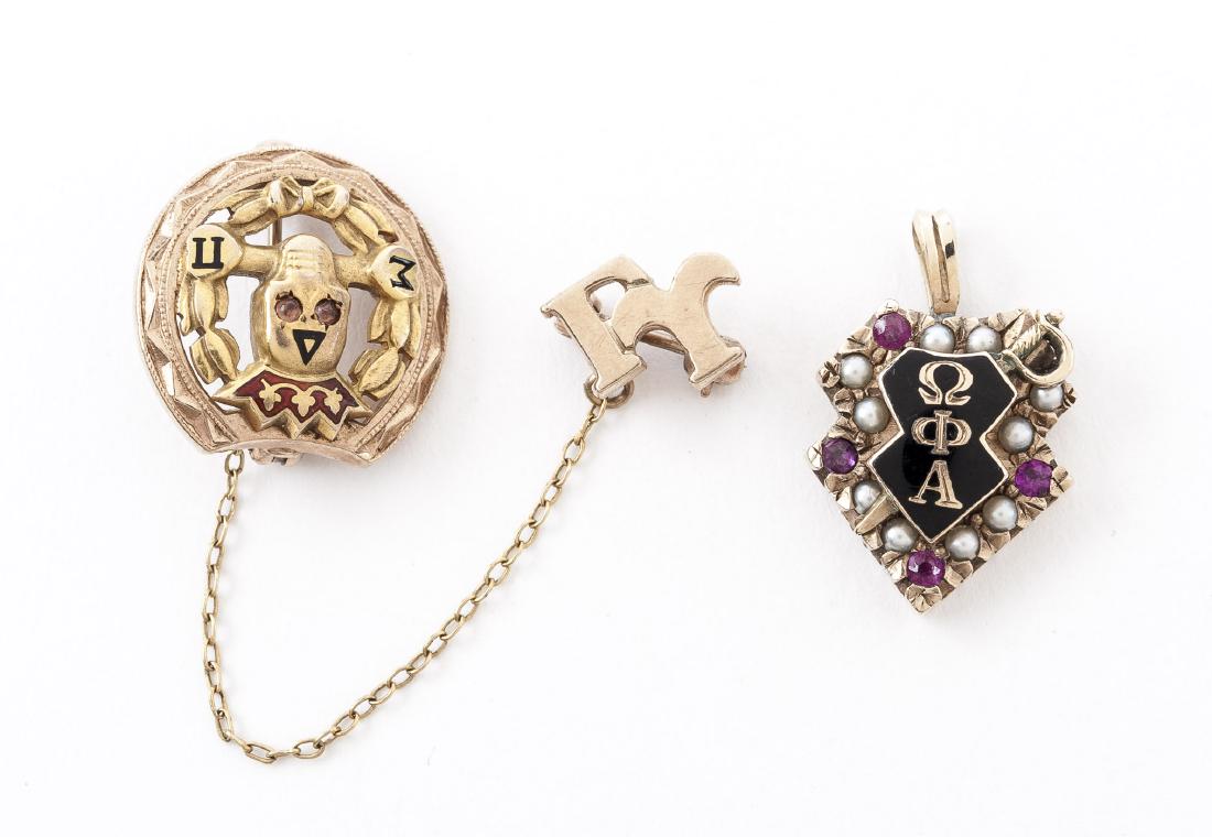 2 Masonic Pins: DESCRIPTION: 14k (stamped) pin with seed pearls and gold pin, each with Masonic emblems and symbols. MEASUREMENTS: 4.2 dwt (6.6 gr). Pin 5/8" with 1-5/8" chain. Fob 3/4". CONDITION: Light wear.