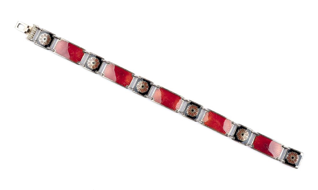 Norwegian D. Andersen Sterling Enamel Bracelet: DESCRIPTION: Sterling link bracelet with red and black enamel and flower detail. Signed D-A Norway for David Andersen, stamped sterling. MEASUREMENTS: 7" long. CONDITION: Light wear.