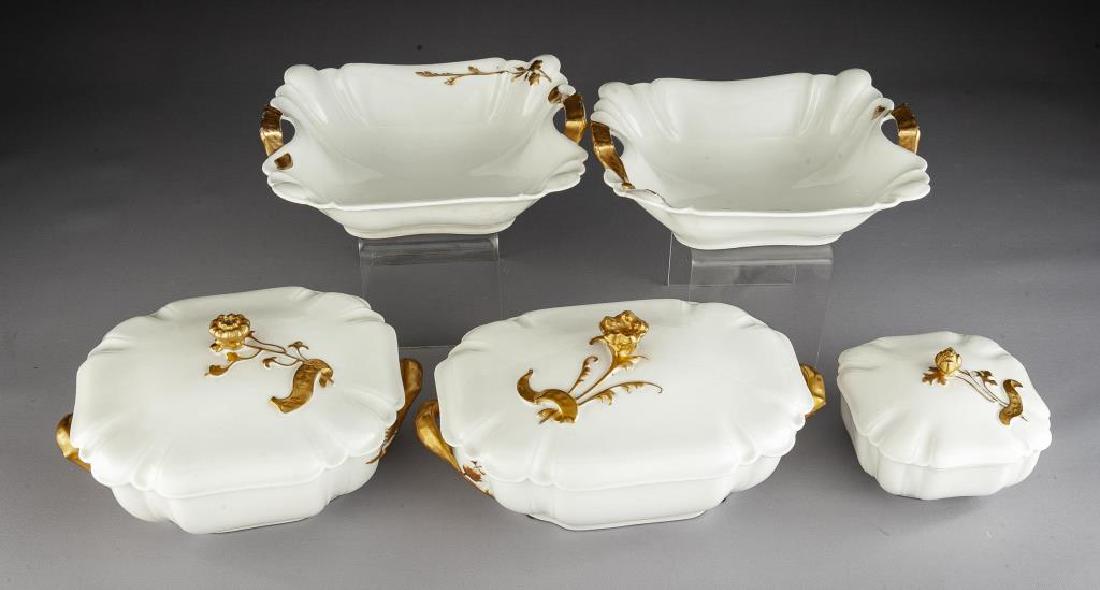 5 Pcs Haviland Limoges China Serveware: DESCRIPTION: Five pieces Haviland & Co. Limoges china serveware with gilt painted flowers with ribbon design. Each marked for Haviland. Includes one 11"x 6-1/2" covered vegetable bowl, one 7-3/8" x 7-
