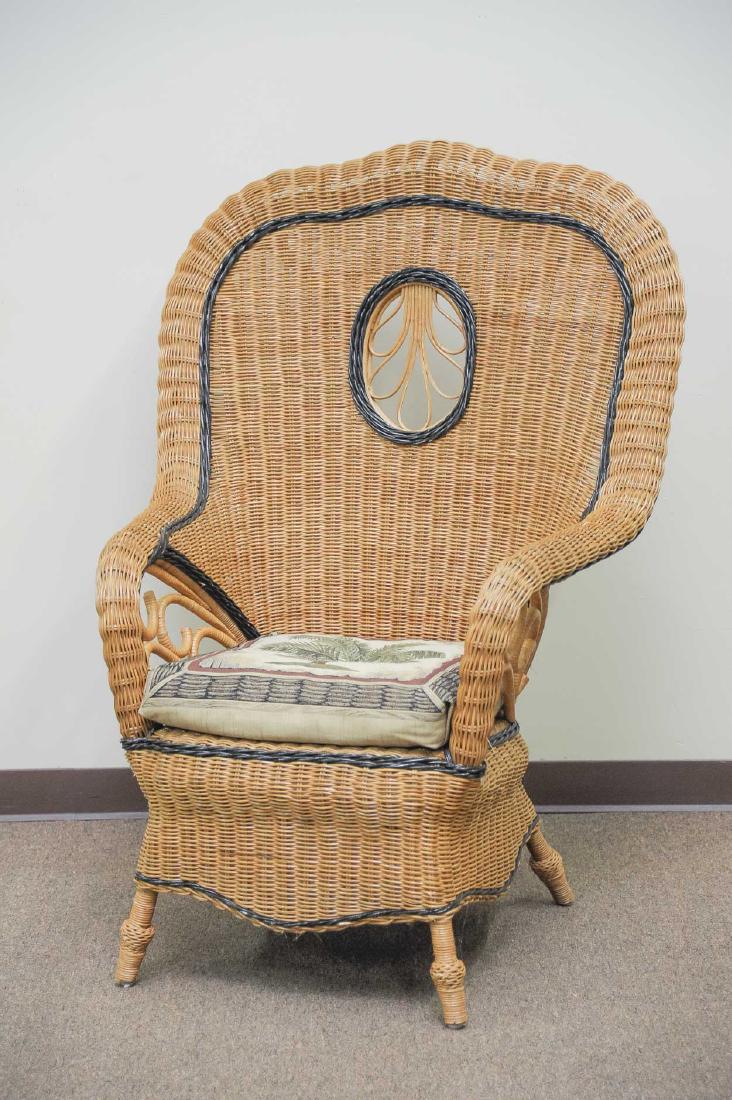 Wicker Arm Chair: DESCRIPTION: Wicker arm chair. MEASUREMENTS: 37-1/2" x 29" x 51".