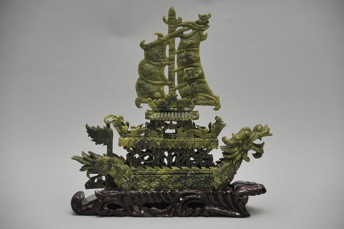 Jade Ship on Wood Base: DESCRIPTION: Jade ship on wood base. MEASUREMENTS: 14" x 3-1/2" x 15".