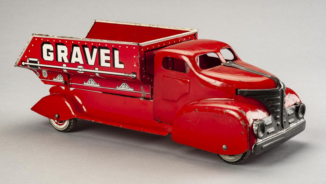 Marx Pressed Steel Sand & Gravel Truck: DESCRIPTION: Marx pressed steel sand and gravel truck. Marked on bottom "Made in U.S.A. Marx Toys". Original paint. MEASUREMENTS: 13" x 5" x 4-1/2". CONDITION: Losses and scratches to paint.