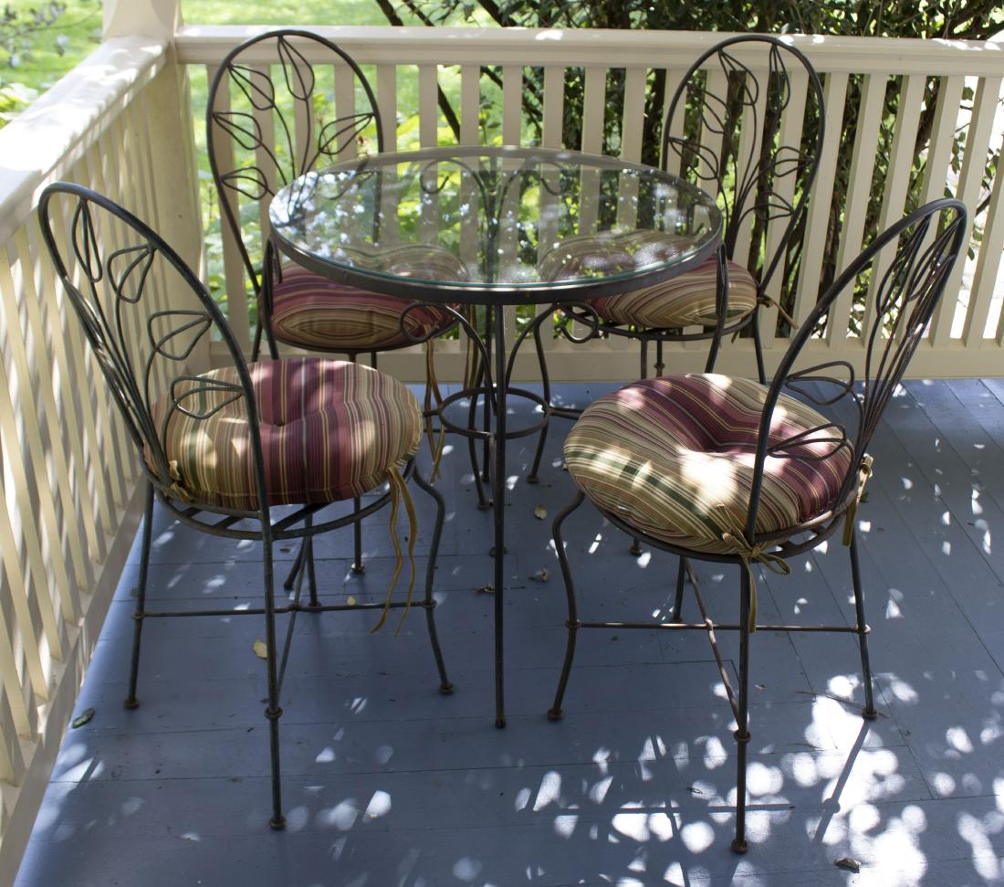 Glass Top Table and Chairs: DESCRIPTION: Glass top table and 4 chairs with cushions. MEASUREMENTS: Table 28" x 28" x 29" high. Chairs each 16" x 15" x 36" high.