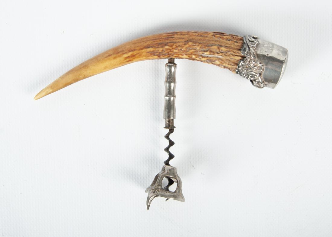 20th C. J.F. Fradley & Co Horn Sterling Corkscrew: DESCRIPTION: American stag horn and sterling silver corkscrew. Early 20th century. Silver end with impressed marks 391, Sterling and cross mark for J.F. Fradley & Co. Monogrammed. MEASUREMENTS: 9" x 6