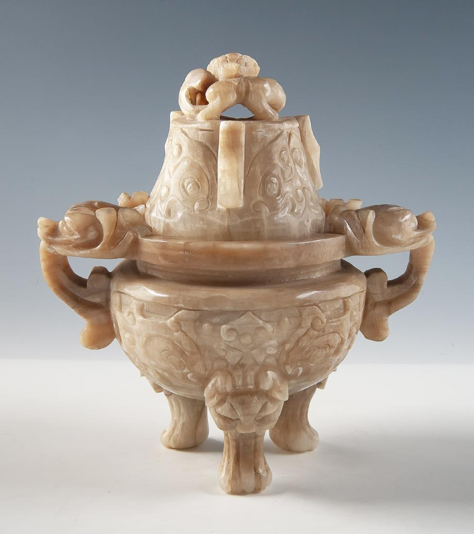 Soapstone Tripod Incense Burner: DESCRIPTION: Carved soapstone tripod incense burner. Light colored stone carved with opposing dragons and dragon on lid. MEASUREMENTS: 8" high x 7-1/2" high. CONDITION: Losses to one dragon.