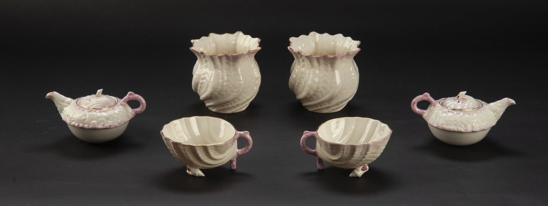 4 Pcs Belleek Pink Neptune incl 1 Person Tea Sets: DESCRIPTION: Four pieces of Belleek in Pink Neptune pattern with gold trim. Includes two 4" high one person tea sets marked "Belleek" in green to bottom and two 4-1/2" pots with 11th (green) mark to b