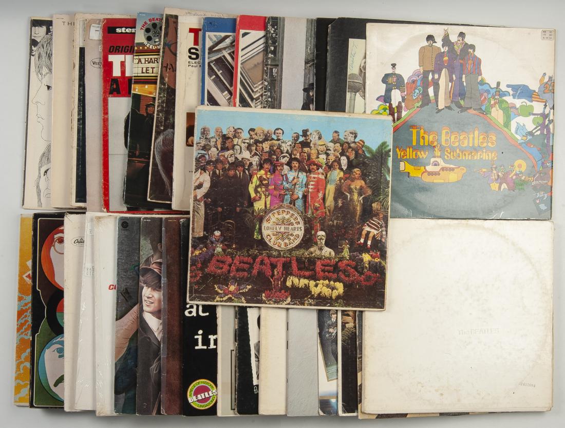 Collection of 35 Beatles' Albums: DESCRIPTION: Collection of thirty-five Beatles albums. includes The White Album, Hey Jude, 1962-1966, 1967-1970, Meet the Beatles, Introducing...the Beatles (second version), Yellow Submarine, Abbey R