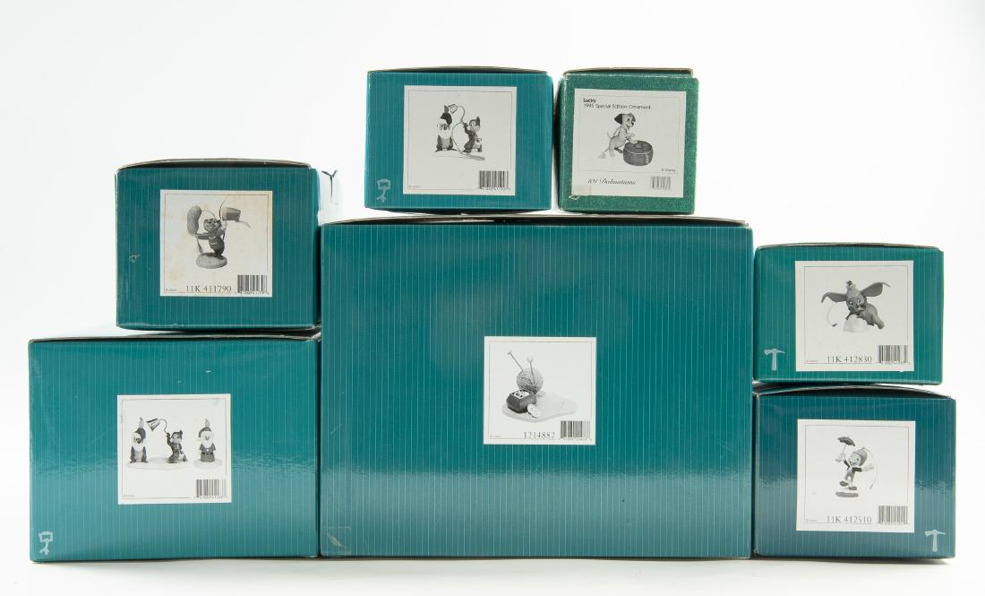 6 Disney Classics Collectibles in OBS: DESCRIPTION: Six Disney Classic Collection collectibles in original boxes. Includes 1214882, 11K 411790, 12690487, 12685587, 11K 412830, and 1995 Special Edition Ornament 101 Dalmations Lucky. MEASURE