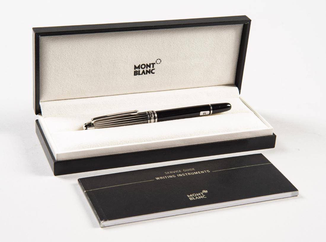 Mont Blanc Meisterstuck Fountain Pen: DESCRIPTION: Mont Blanc Meisterstuck fountain pen with black and silver colored resin case and pinstripe cap. 18k gold nib. In original box and case with service guide. MEASUREMENTS: 5-1/4" long. COND