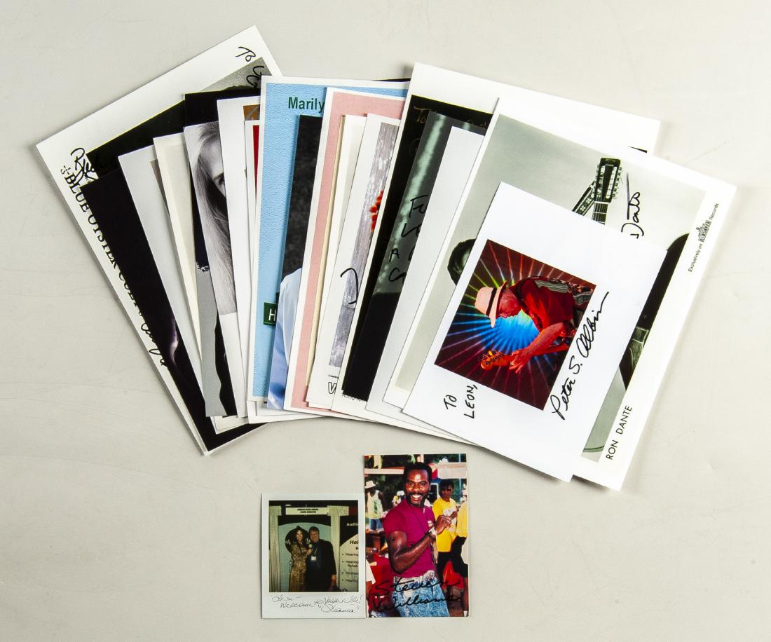 20 Autographed Photos Rock and Music: DESCRIPTION: Twenty autographed photos of rock and music including Shania Twain, Blue Oyster Cult, Gene Simmons, Nelson, Mickey Dolenz, and others. MEASURMENTS: Various. Primarily 8" x 10". CONIDITON: