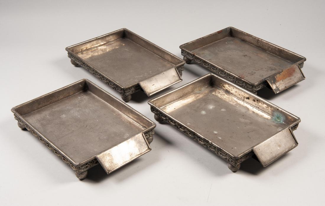 4 Candy Store Display Trays: DESCRIPTION: Four silver candy store display trays with draped ribbon tied design, ball feet, and front card or label slot. MEASURMENTS: Each 8" wide x 11" deep x 2" tall with feet. CONDITION: Good. T