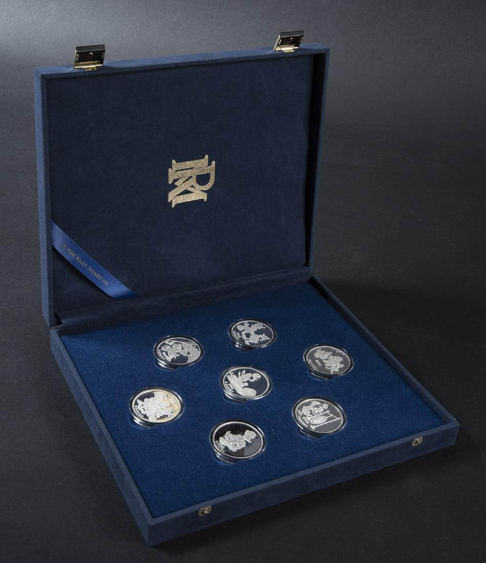 Donald Duck's 55th Ann Silver Coin Set: DESCRIPTION: Donald Duck's 55th Anniversary .999 silver coin set with seven rare limited proof edition coins. Includes 1934 "A Star is Hatched", 1945 "Personality Plus", 1955 "Media Duck", 1961 "Profe