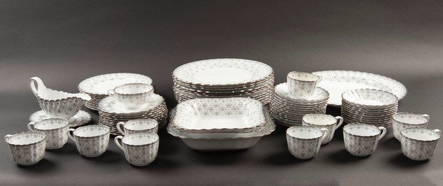 77 Pcs Spode Fleur de Lys Grey China Dinnerware: DESCRIPTION: Seventy-seven pieces of Spode bone china dinnerware in the Fleur de Lys Grey pattern. Marked on bottom. Includes twelve 10-5/8" dinner plates, eleven 8-1/8" salad plates, twelve 6-1/2" br