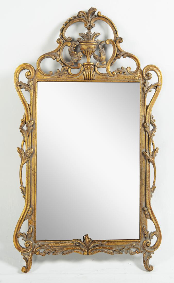 Gold Wall Mirror with Urn and Foliate Design: DESCRIPTION: Gold painted wood wall mirror with urn and foliate design. MEASUREMENTS: 33-3/4" wide x 59" high. CONDITION: Very good. Light surface wear.