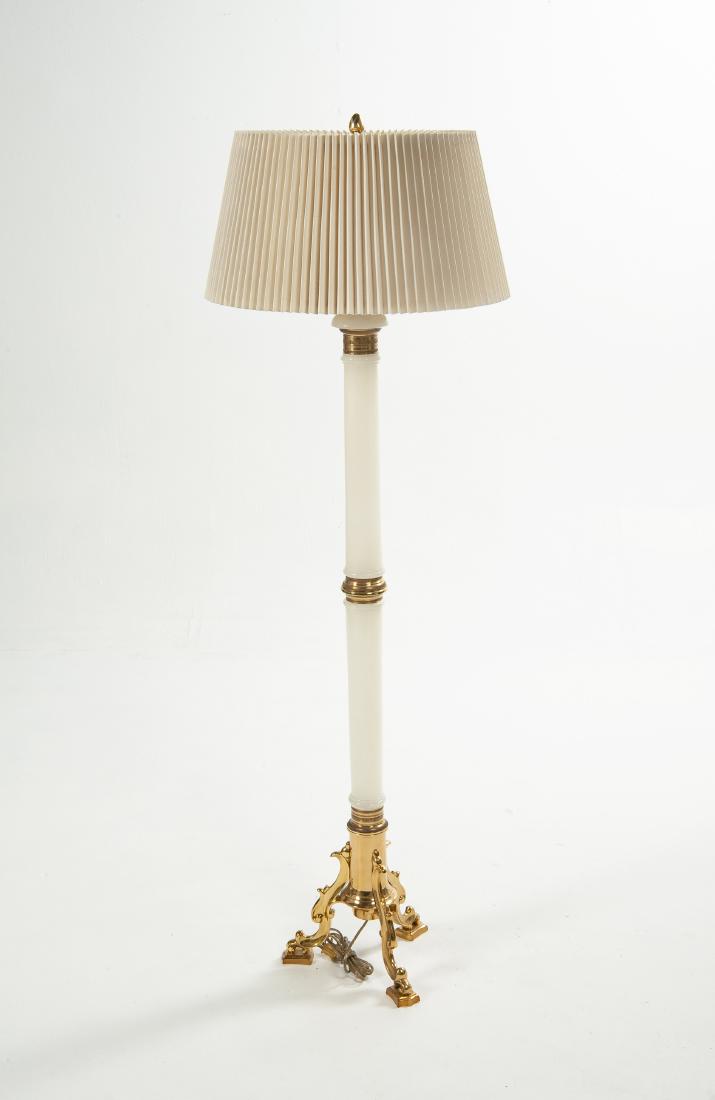 Alabaster and Brass Floor Lamp: DESCRIPTION: Alabaster and brass floor lamp. Alabaster column with brass accents on three-part footed base. With pleated linen shade. MEASUREMENTS: 57" high overall. CONDITION: Excellent.