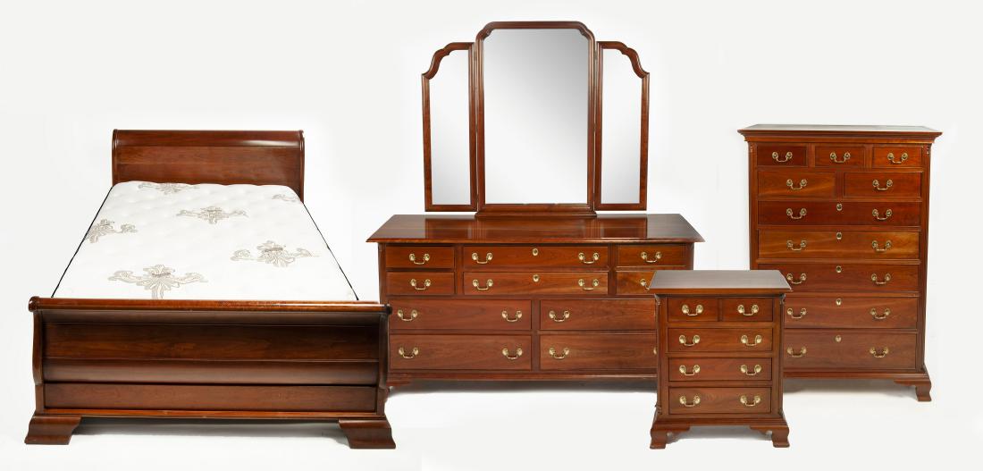 4 Piece Stickley Bedroom Set: DESCRIPTION: Four piece Stickley bedroom set. All with brass pulls. All marked for Stickley. Includes: 1) Queen size sleigh bed frame. 67-1/2" wide x 90" long x 43" high. Includes Stearns & Foster mat