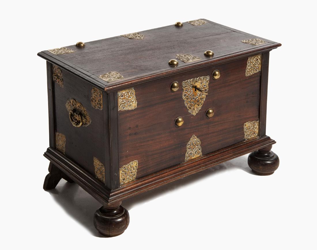 Dutch Colonial Style Chest with Brass Fittings: DESCRIPTION: Dutch Colonial style blanket chest. Hardwood with brass fittings. On a pair of stands each with one ball and one bracket foot. With key. MEASUREMENTS: 30" wide x 17" deep x 15-1/2" high. 
