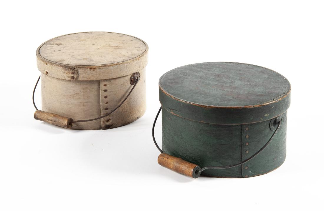 2 Painted Pantry Boxes With Wire Bails: DESCRIPTION: Two painted pantry boxes with wire bails and wooden handles. Includes: 1) Dark green exterior painted pantry box. With yellow painted interior. 9-1/2" x 5-1/4". 2) Dry putty painted pantr
