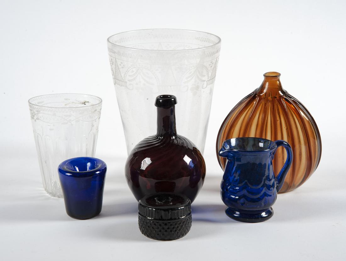 7 Pcs American Blown Glass: DESCRIPTION: Seven pieces American blown glass. Includes: 1) Amethyst colored bottle with swirl pattern and rough pontil. 5". 2) Amber colored flask shaped bottle with lined pattern and rough pontil. 