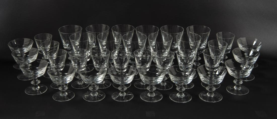 35 Pcs Val St Lambert Crystal Stemware: DESCRIPTION: 35 pieces of Val St Lambert crystal stemware in "State Plain" pattern. Includes twelve 4" sherbets, twelve 5-1/8" cordial glasses, and eight 6-3/8" water goblets. MEASUREMENTS: See descri