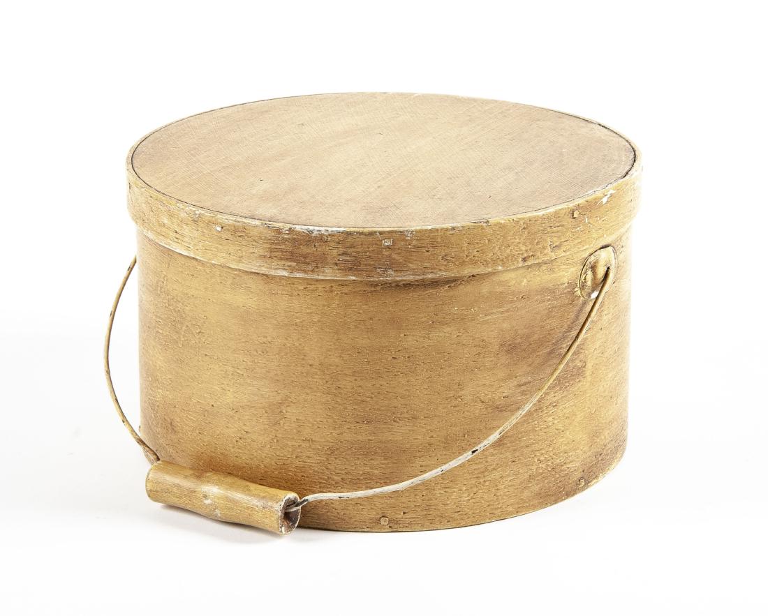 Yellow Painted Pantry Box: DESCRIPTION: Yellow painted pantry box. With wire bail and wooden handle. 19th century. MEASUREMENTS: 11-1/4" x 6-1/4". CONDITION: Surface wear.
