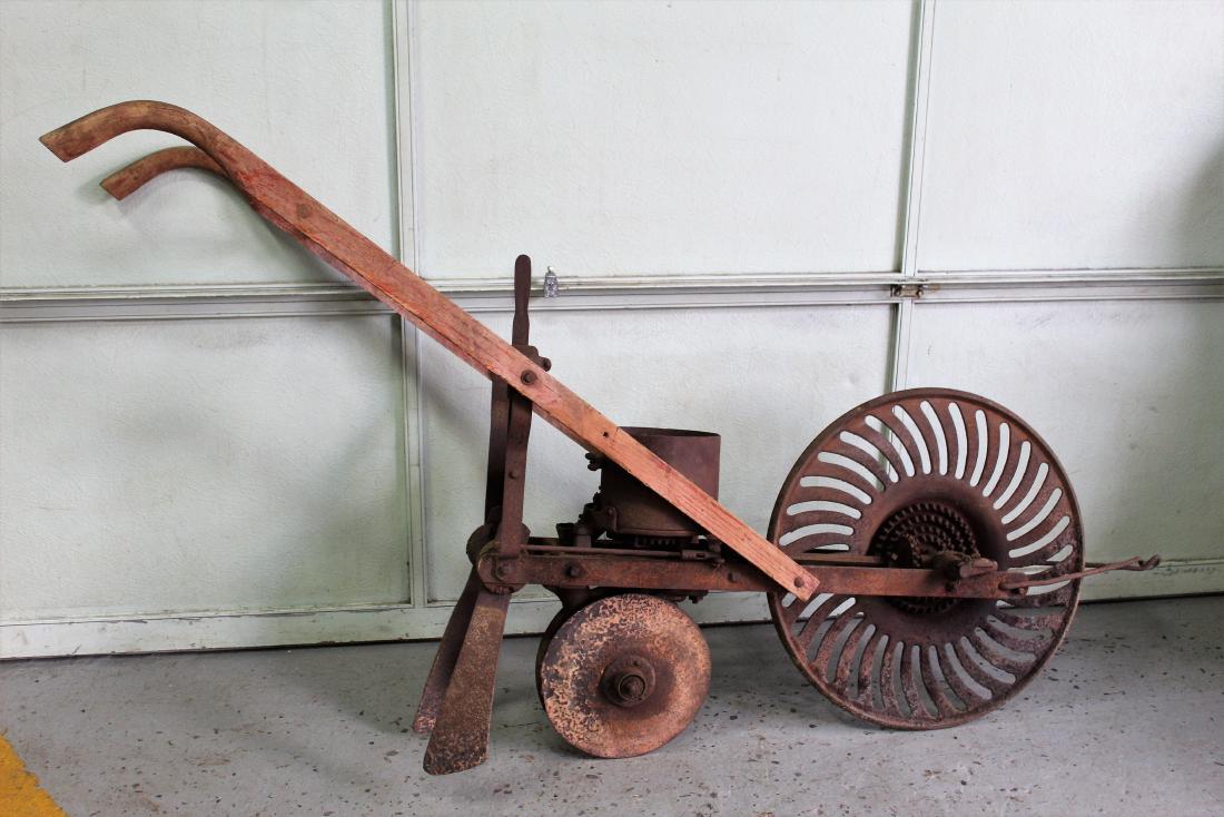 Antique Plow with Wheel