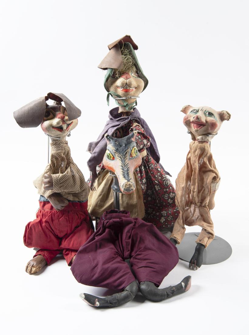 4 Papier-Mache Puppets Incl WPA: DESCRIPTION: Four papier-mache hand puppets. Each with wood feet and hands, hand painted faces, and hand sewn garments. Includes: 1) Two rabbits with WPA State-Wide Museum Extension patches. 2) One Li