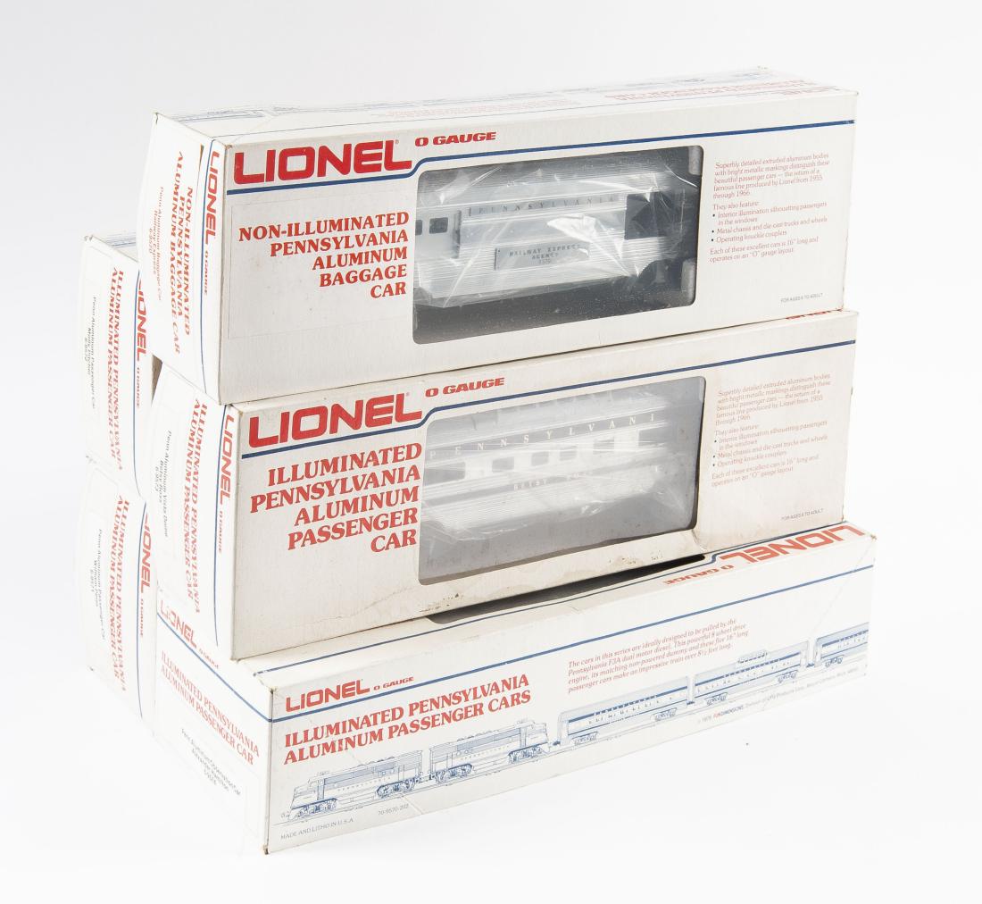 5 Lionel PRR Aluminum Passenger Cars in OBs: DESCRIPTION: Five Lionel Pennsylvania aluminum passenger cars in original boxes. Includes 6-9570 baggage car Railway Express, 6-9571 passenger car William Penn, 6-9572 passenger car Molly Pitcher, 6-9
