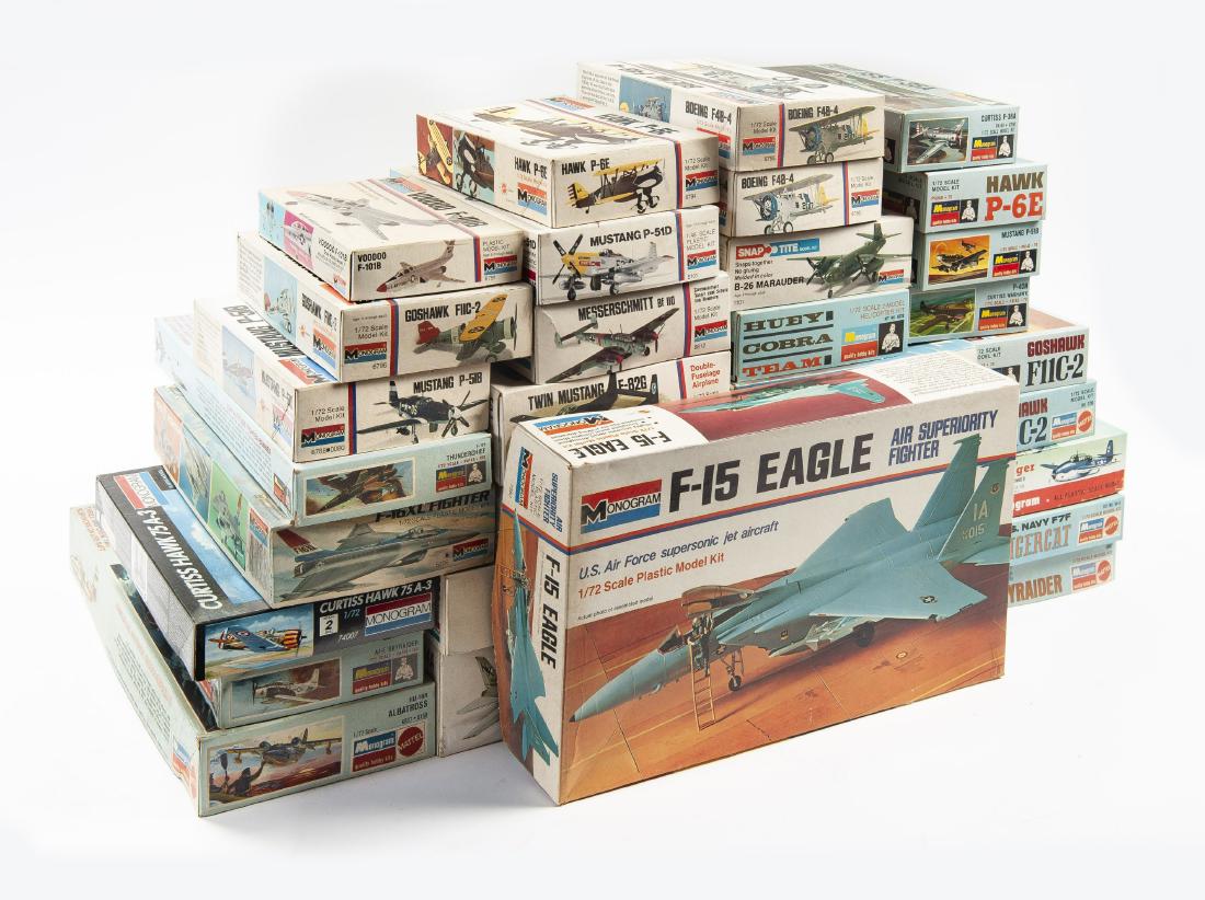 33 Monogram 1/72 Scale Airplane Model Kits: DESCRIPTION: Thirty-three Monogram 1/72 scale airplane model kits. Includes two 6795, 6019, 5101, 6812, 6794, 6796, 6788, 6791, 5992, 7580, 6848, 5431, 5435, 5405, 74007, 1108, 1101, 0175, 5206, F105,