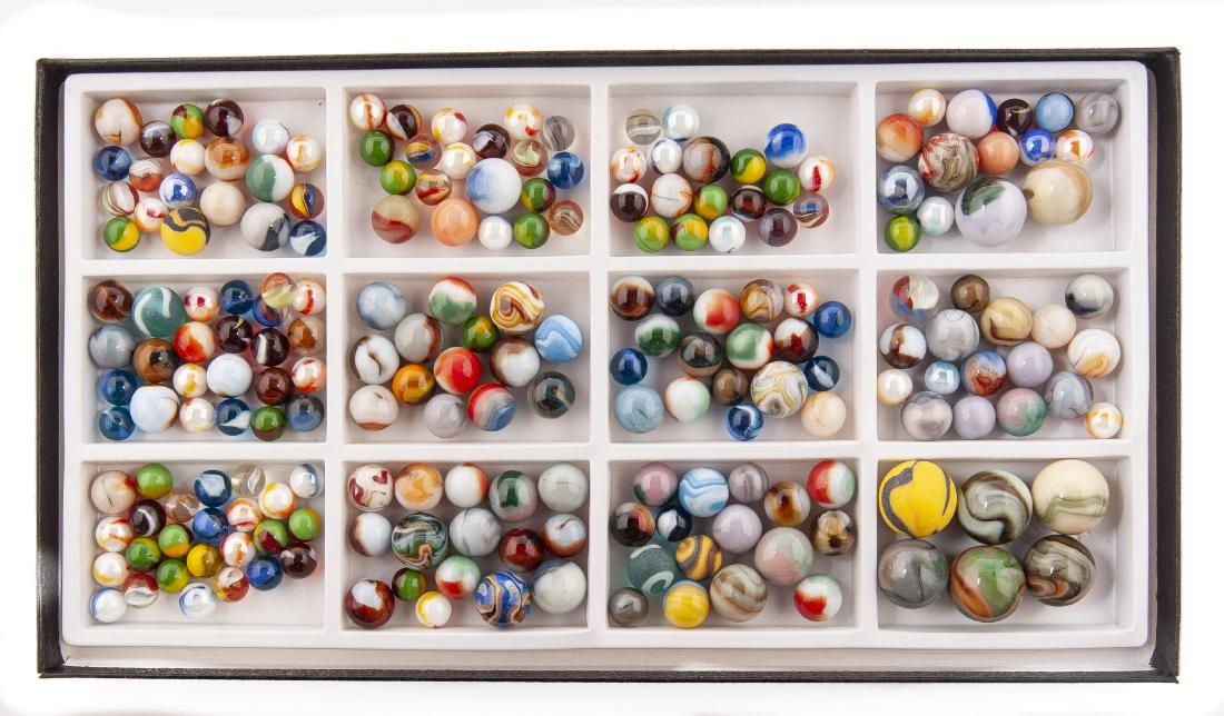 209 Machine Made Marbles: DESCRIPTION: 209 Machine made marbles. Various manufacturers. MEASUREMENTS: Sizes range from 1/2" to 9/10". CONDITION: Excellent.