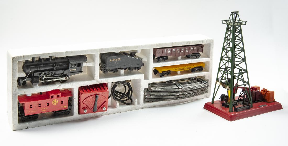 Lionel Cannonball Train Set & 455 Oil Derrick: DESCRIPTION: Lionel Cannonball electric train set in original insert and #455 oil derrick. Set includes 8300 locomotive and tender, 9031 gondola, 9024 flat car, 9061 caboose, transformer and track. ME