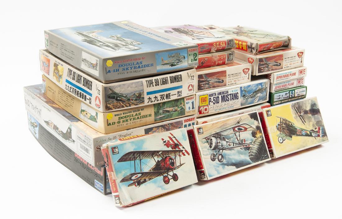 22 1/72 Scale Japanese Model Airplane Kits: DESCRIPTION: Twenty 1/72 scale Japanese model airplane kits. Includes Mania: 06800, 02800, 01800. Tsukada: WP02, WP01, SO5. Fuji: 088, 090, 085, 086, 087, 089. World Famous Aircraft Series: Two Mig 19