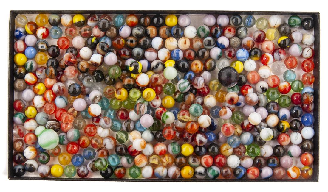 359 Hand and Machine Made Marbles: DESCRIPTION: 359 handmade and machine made marbles. Includes swirls, akro, vitro, slags, striped, patches, agates, clay, and more. MEASUREMENTS: Each approximately 1/2". CONDITON: Older marbles bruise