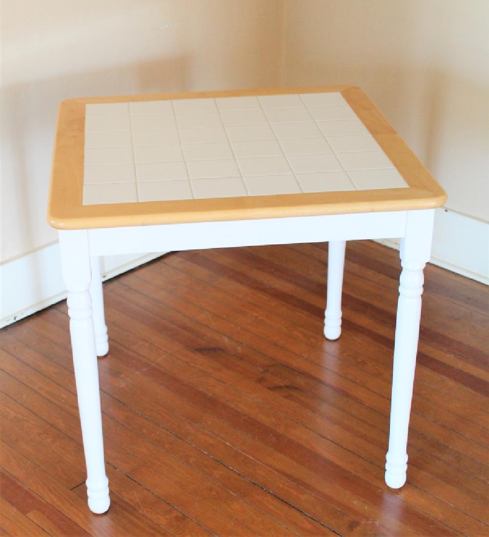 White Tilt Top Table: MEASUREMENTS: 31" wide x 32" deep x 29" high.