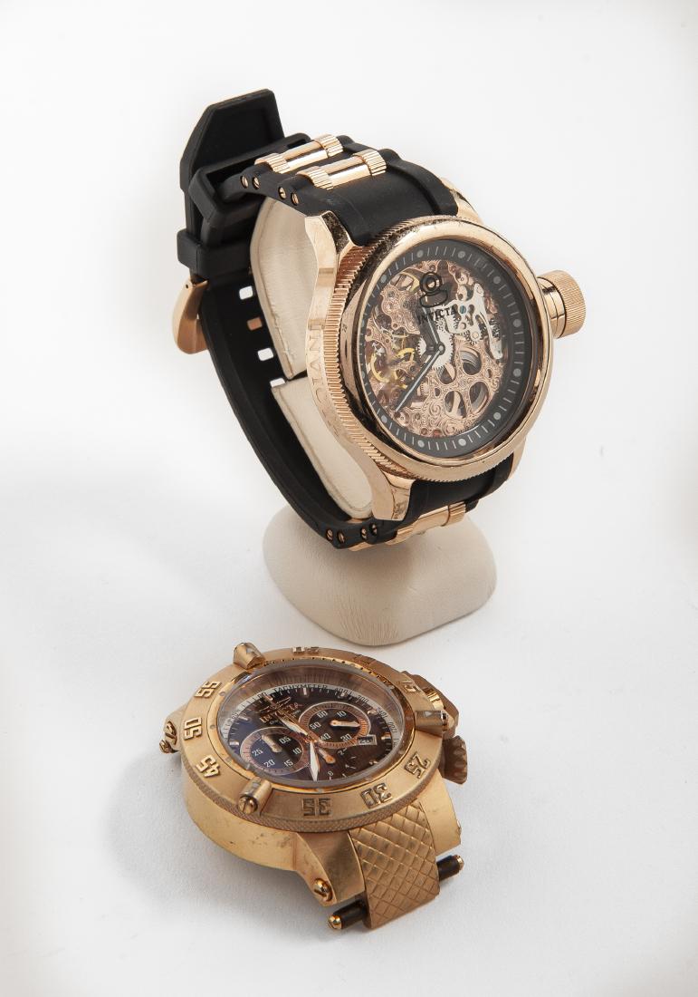 2 Invicta Wristwatches: DESCRIPTION: Two Invicta wristwatches. Models 1090 and 5510. MEASUREMENTS: Both 2-1/2" lug to lug. CONDITION: Very light wear. One missing band.