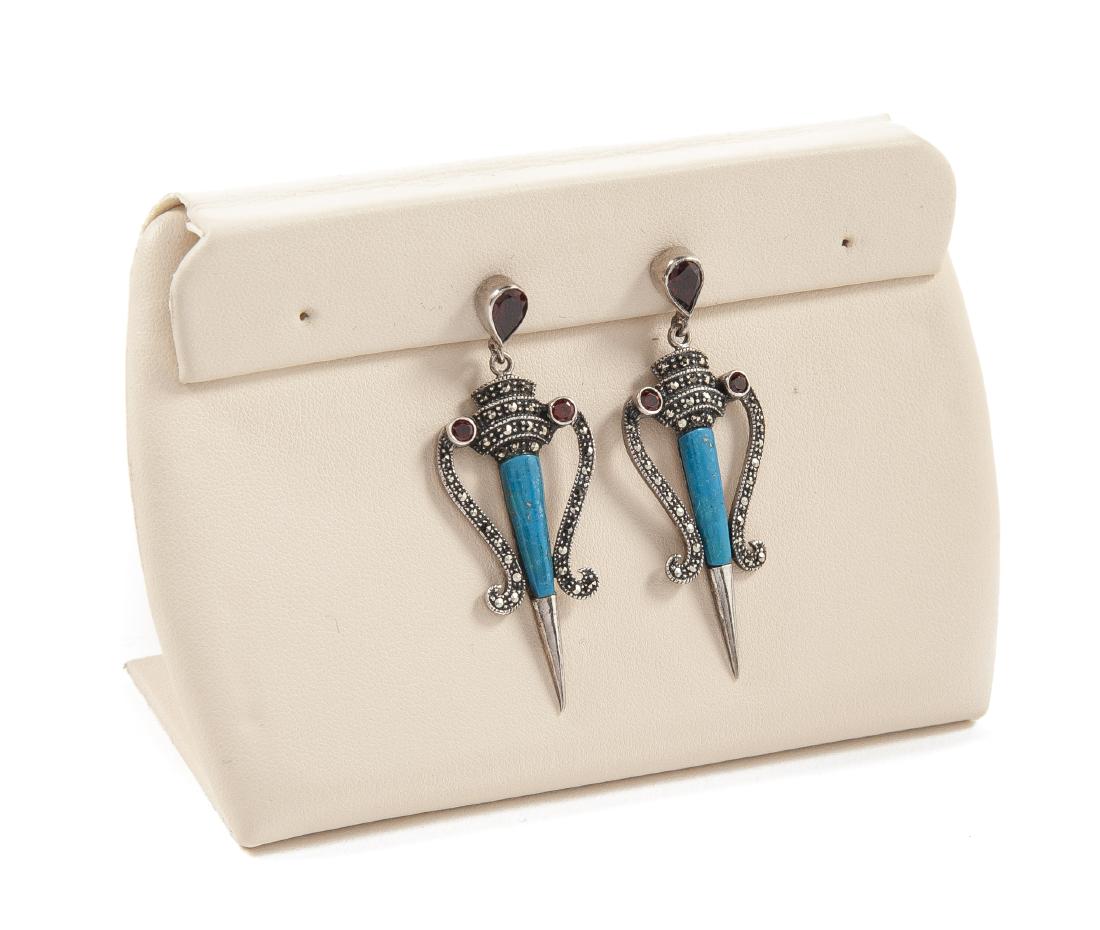 Sterling and Marcasite Pierced Earrings: DESCRIPTION: Sterling, turquoise and marcasite pierced earrings. Both marked "925" to back. MEASURMENTS: 2-1/4" long. CONDITION: Good. Light wear.
