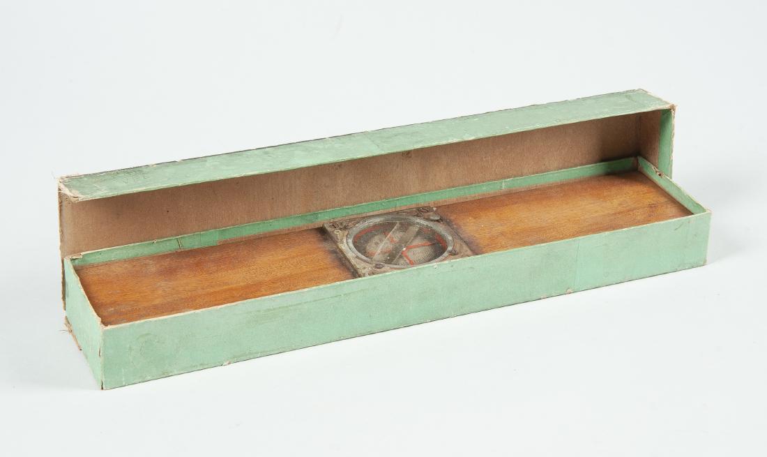 Melick Clinometer No. 2 Measuring Tool: DESCRIPTION: Melick clinometer in original box. Model No. 2. Wood block with measuring tool at center under glass. Face etch marked W. B. Melick Clinometer Pat Dec 3rd 1889 Grading Scale". MEASUREMENT