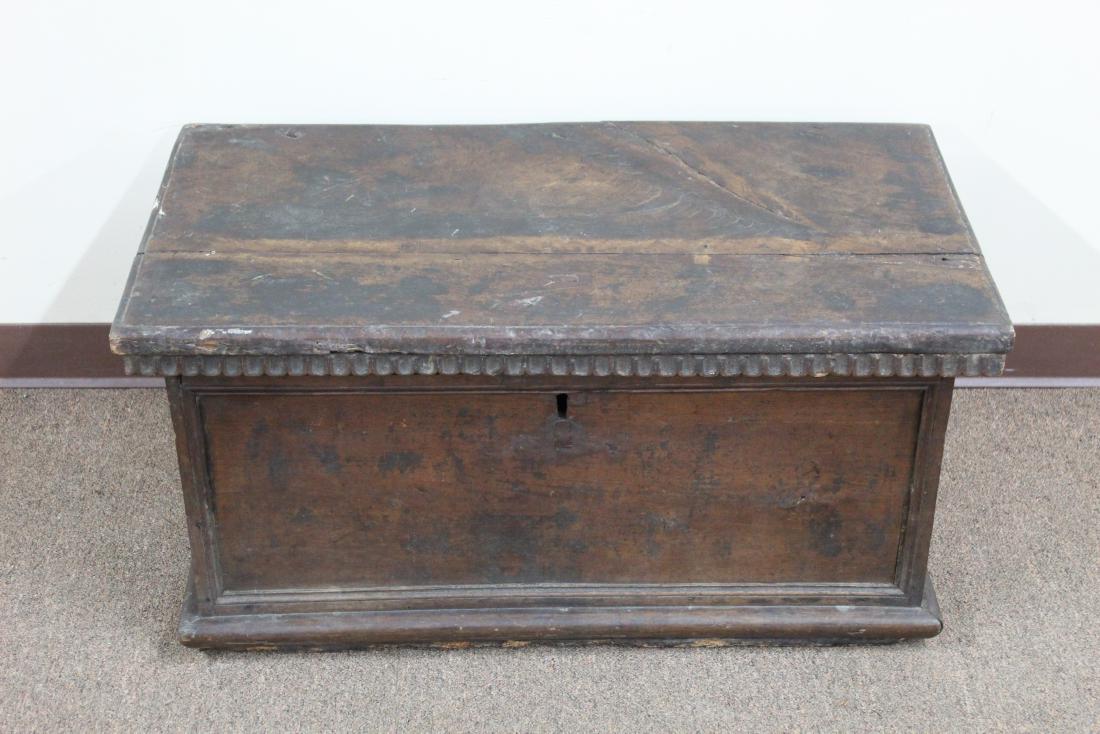 Antique Blanket Chest: Missing Pins to hardware lid. Crack and split to wood top. Wood losses to back. MEASUREMENTS: 36" wide x 20" deep x 18" high.