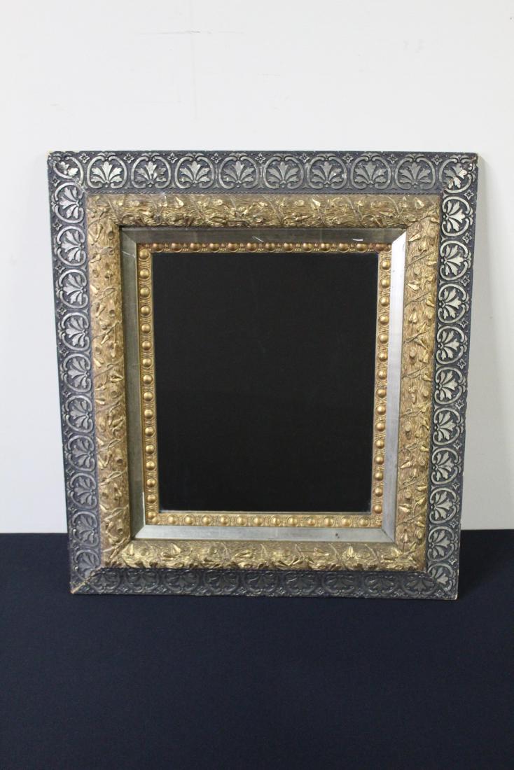 Antique Mirror: MEASUREMENTS: 25-1/4" high x 28-1/4" wide. Some losses to frame.