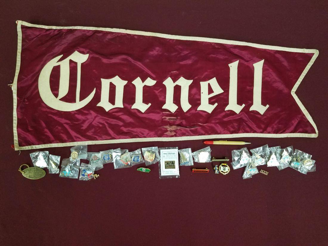 32 Pcs Cornell Pennant and Pins: Pens mostly in Pennsylvania related including State Police. Pennant with some tears. 35 in Long.