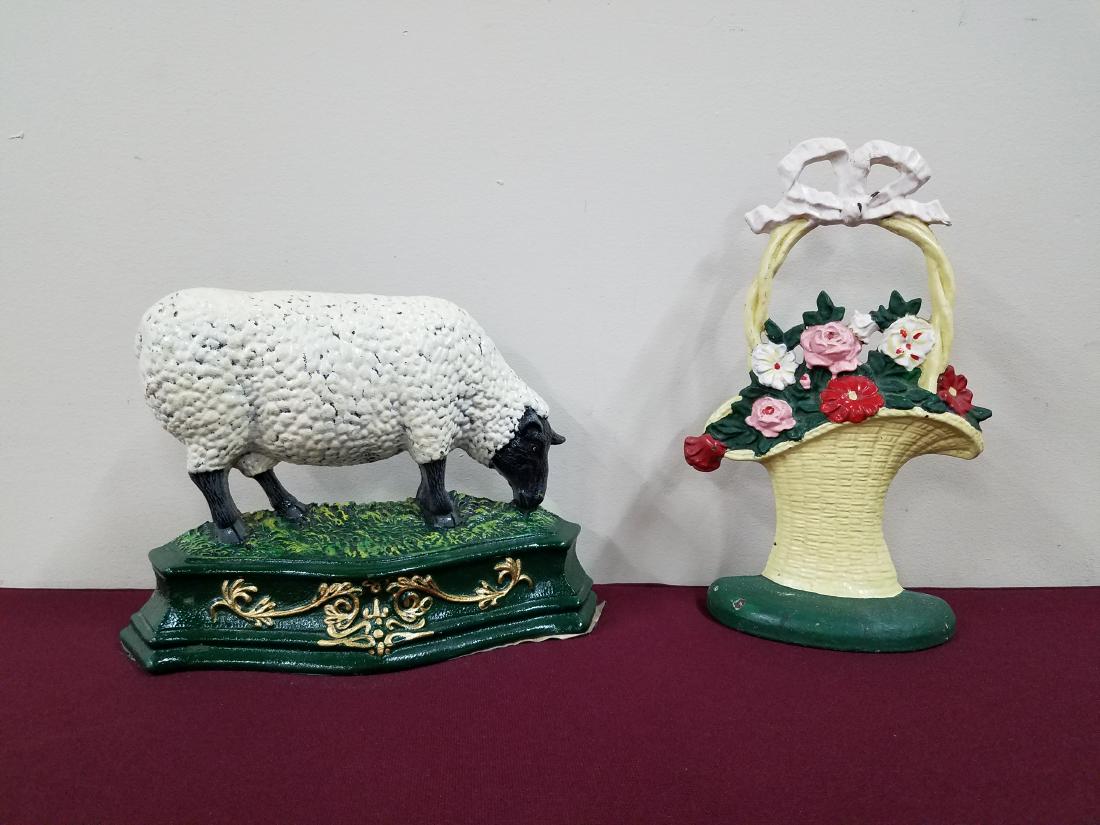 2 Painted Cast Iron Door Stops: 7-1/2" to 11" high.