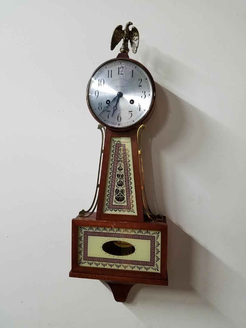 Seth Thomas Banjo Clock: Eagle finial. 29-1/2" High x 9-3/4".