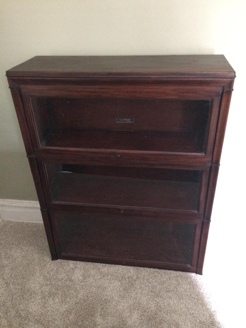 B. H. Rogers 3 Section Barrister Bookcase: 35” wide x 12” deep x 44-1/2” high.